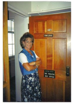 Pam-in-front-of-door-250×353